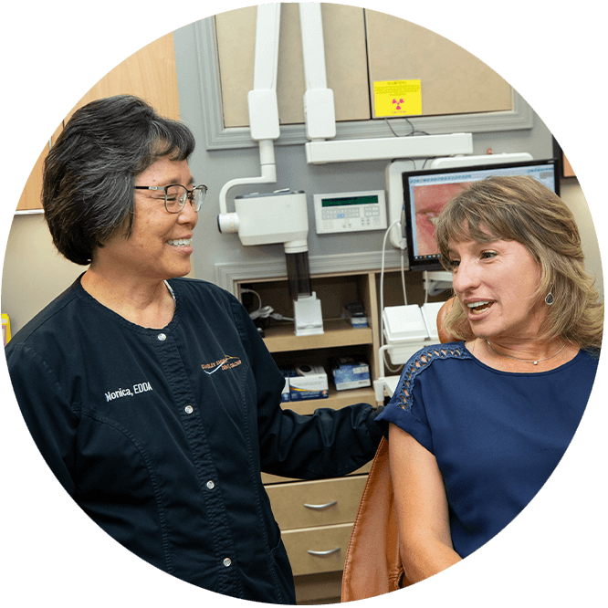 Team member consulting with Patient